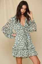 Load image into Gallery viewer, Soft jade colored v-neck double ruffle chiffon lined dress with tie detail.
