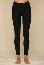 Load image into Gallery viewer, Black seamless leggings with gusset and 2&quot; ribbed band at waist.  Appx 9&quot; rise.
