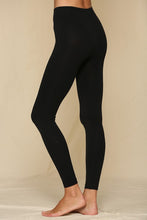 Load image into Gallery viewer, Black seamless leggings with gusset and 2&quot; ribbed band at waist.  Appx 9&quot; rise.
