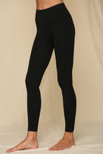 Load image into Gallery viewer, Black seamless leggings with gusset and 2&quot; ribbed band at waist.  Appx 9&quot; rise.
