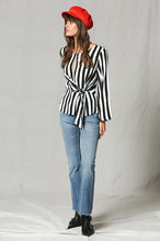 Load image into Gallery viewer, Black and white striped long sleeve top with subtle bell sleeve, side-tie &amp; front keyhole detail.
