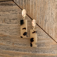 Load image into Gallery viewer, Acrylic dangle earrings with gold oval post detail.  Earring measures approx 1.5&quot;.  Metal Content: Blended Metal. Color: Nude Tortoise
