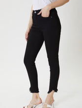 Load image into Gallery viewer, Black cotton blend high rise skinny ankle fit with raw fringe hem
