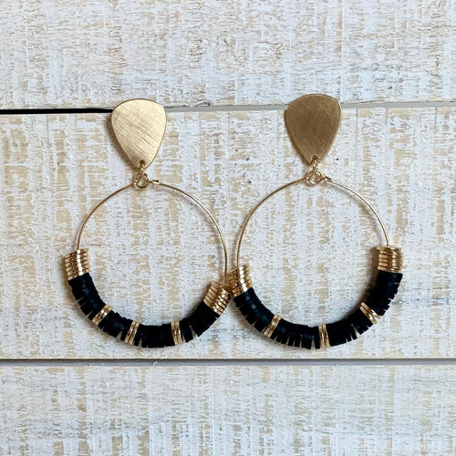 Gold/black combo metal hoops with disk detail. Earrings measure approx 2.5