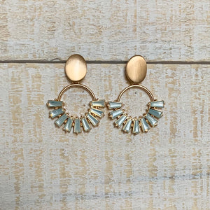 Glass beaded fan hoops with gold post detail.  Earring measures approx 1.25".  Metal Content: Blended Metal. Color: White Opal