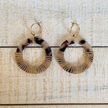 Load image into Gallery viewer, Chain wrapped acrylic dangle hoops with gold hoop post.  Earring measures approx 2.25&quot;.  Metal Content: Blended Metal. Color: Nude tortoise.
