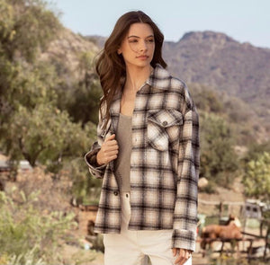 Black/ taupe/ white plaid button down shacket. Oversized, relaxed fit. 100% Cotton.